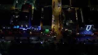 5K aerial stock footage of Ocean Drive hotels at night in South Beach, Florida Aerial Stock Footage | AX0023_123E