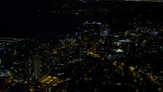 5K aerial stock footage of passing office buildings at night in Coconut Grove, Florida Aerial Stock Footage | AX0023_186