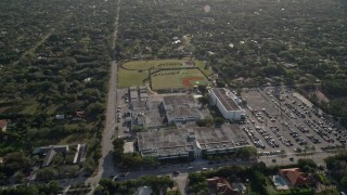 AX0024_002 - 5K aerial stock footage of approaching Miami Killian Senior High School, Kendall, Florida