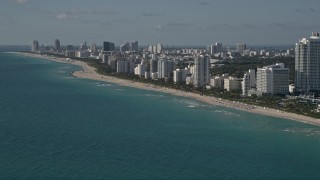 5K aerial stock footage of flying by hotels, apartments, South Beach,  Miami Beach, Florida Aerial Stock Footage | AX0024_088