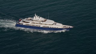 AX0024_109E - 5K aerial stock footage of orbiting a yacht, Atlantic Ocean, Miami, Florida