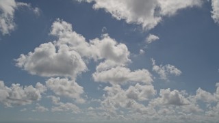 5K aerial stock footage of approaching clouds above, Miami, Florida Aerial Stock Footage | AX0025_004