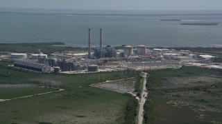 5K aerial stock footage of flying by Turkey Point Power Plant, Homestead, Florida Aerial Stock Footage | AX0025_021