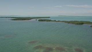 5K aerial stock footage of flying by coastal mangroves, Key Largo, Florida Aerial Stock Footage | AX0025_072