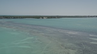 5K aerial stock footage of approaching a home on the shore, Tavernier, Florida Aerial Stock Footage | AX0025_083E