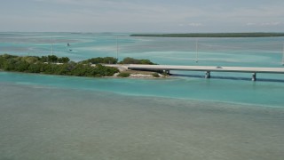 AX0025_122 - 5K aerial stock footage of flying by Overseas Highway, Islamorada, Florida