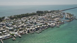 5K aerial stock footage of approaching and flying by coastal neighborhood, Long Key, Layton, Florida Aerial Stock Footage | AX0025_142