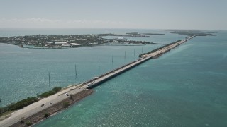 AX0025_149 - 5K aerial stock footage of following Overseas Highway by Duck Key, Marathon, Florida