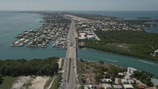 5K aerial stock footage of the Overseas Highway and Florida Keys Marathon Airport, Marathon, Florida Aerial Stock Footage | AX0025_164