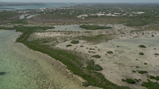 AX0026_048 - 5K aerial stock footage of flying by mangroves on the island shore, Big Pine Key, Florida