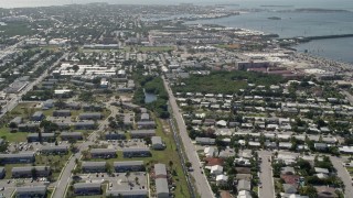 5K aerial stock footage of flying over neighborhood, revealing Poinciana Mobile Home Park, Key West, Florida Aerial Stock Footage | AX0026_061