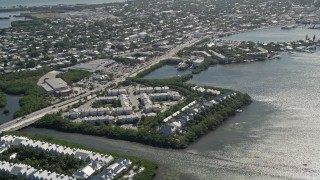 5K aerial stock footage of flying by condominiums on the shore of Key West, Florida Aerial Stock Footage | AX0026_064