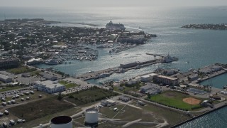 5K aerial stock footage of flying over Trumbo Point, with a view of a cruise ship in Key West, Florida Aerial Stock Footage | AX0026_066