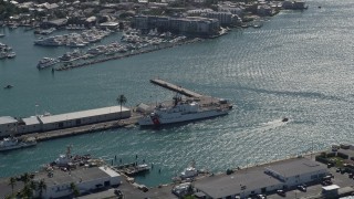 5K aerial stock footage of flying by US Coast Guard ship docked at Trumbo Point, Key West, Florida Aerial Stock Footage | AX0026_067