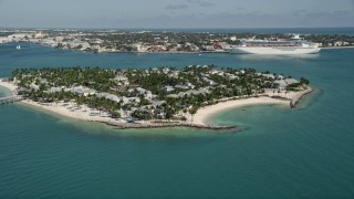 5K aerial stock footage of flying by Sunset Key by Key West, Florida Aerial Stock Footage | AX0026_093