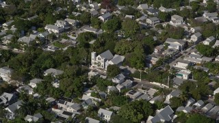 5K aerial stock footage of a church in a residential neighborhood, Key West, Florida Aerial Stock Footage | AX0027_020