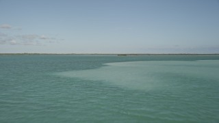 AX0027_052 - 5K aerial stock footage of flying low over the water, Upper Sugarloaf Sound, Florida