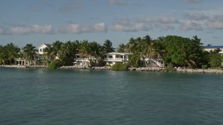 5K aerial stock footage of flying by homes on Summerland Key, Florida Aerial Stock Footage | AX0027_071