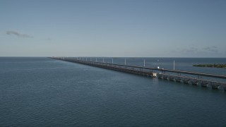 AX0027_073E - 5K aerial stock footage of a truck on Seven Mile Bridge, Florida