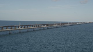 AX0027_079 - 5K aerial stock footage of light automobile traffic on the Seven Mile Bridge, Florida