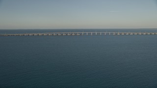 5K aerial stock footage of approaching bridge at sunset on Overseas Highway, Long Key, Florida Aerial Stock Footage | AX0028_019