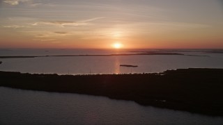 5K aerial stock footage of flying by bays and mangroves, Key Largo, Florida, sunset Aerial Stock Footage | AX0028_042