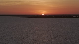 5K aerial stock footage of ascending over the water, Key Largo, Florida, sunset Aerial Stock Footage | AX0028_047