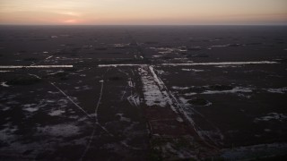 5K aerial stock footage of flying by wetlands, Southern Glades, Florida, twilight Aerial Stock Footage | AX0028_056