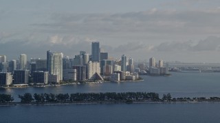 5K aerial stock footage of flying by Downtown Miami skyline, Florida, sunrise Aerial Stock Footage | AX0029_009E