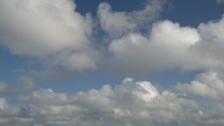 AX0030_059 - 5K aerial stock footage of following clouds overhead, Florida Everglades, Florida