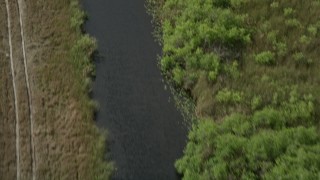 5K aerial stock footage of following a river, Florida Everglades, Florida Aerial Stock Footage | AX0030_102