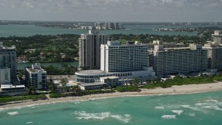 5K aerial stock footage of condominium complex on the beach, Miami Beach, Florida Aerial Stock Footage | AX0031_062