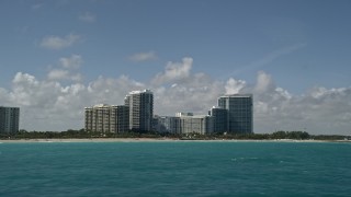 5K aerial stock footage of apartment buildings and ONE Bal Harbour Resort and Spa, Bal Harbour, Florida Aerial Stock Footage | AX0031_071