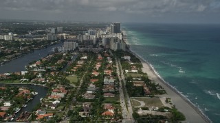 AX0031_088 - 5K aerial stock footage fly over neighborhood, approach Hallandale Beach, Golden Beach, Florida