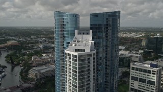 AX0031_116 - 5K aerial stock footage of flying by the top of Las Olas River House, Downtown Fort Lauderdale, Florida