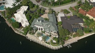 5K aerial stock footage of waterfront mansions beside a canal, Fort Lauderdale, Florida Aerial Stock Footage | AX0031_135