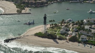 5K aerial stock footage of orbiting the Hillsboro Inlet Light, Hillsboro Beach, Florida Aerial Stock Footage | AX0031_156