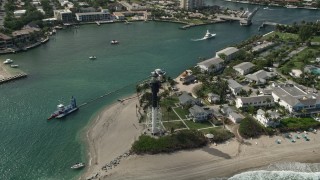 AX0031_161 - 5K aerial stock footage of flying by the Hillsboro Inlet Light, Hillsboro Beach, Florida