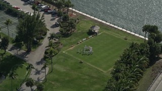 AX0031_175 - 5K aerial stock footage of orbiting croquet players at Hillsboro Club, Hillsboro Beach, Florida