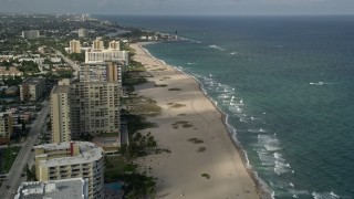 5K aerial stock footage approach beach, revealing Hillsboro Inlet Light, Pompano Beach, Florida Aerial Stock Footage | AX0032_005