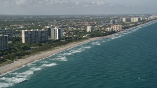 5K aerial stock footage of flying by the coast, seen from over the Atlantic, Boca Raton, Florida Aerial Stock Footage | AX0032_030