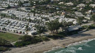 AX0032_049 - 5K aerial stock footage of a mobile home park by the beach, Briny Breezes, Florida