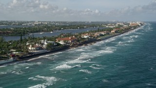 AX0032_058 - 5K aerial stock footage of flying by coastal mansions, Manalapan, Florida