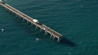 AX0032_064 - 5K aerial stock footage of orbiting the Lake Worth Pier, Palm Beach, Florida