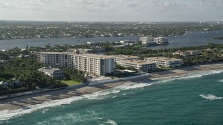 AX0032_067 - 5K aerial stock footage of a coastal condominium complex, Palm Beach, Florida