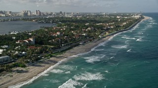 5K aerial stock footage of following the coast past upscale residential neighborhoods, Palm Beach, Florida Aerial Stock Footage | AX0032_075