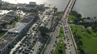 AX0032_084 - 5K aerial stock footage fly over Royal Poinciana Way, reveal Flagler Memorial Bridge, Palm Beach, Florida