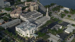 AX0032_090 - 5K aerial stock footage of flying by the First Baptist Church of West Palm Beach, West Palm Beach, Florida