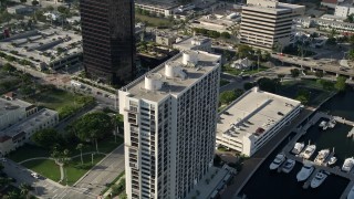 5K aerial stock footage of approaching an apartment building in West Palm Beach, Florida Aerial Stock Footage | AX0032_094