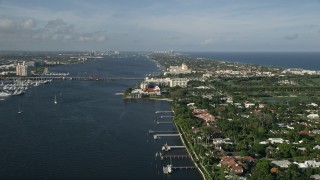 5K aerial stock footage of Flagler Memorial Bridge, Henry Morrison Flagler Museum, Palm Beach, Florida Aerial Stock Footage | AX0032_100